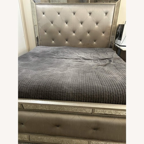 Used Dark Brown Wood King Bed for sale on AptDeco