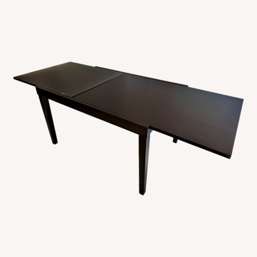 Used Design Within Reach Spanna Extendable Wood Dining Table for sale on AptDeco
