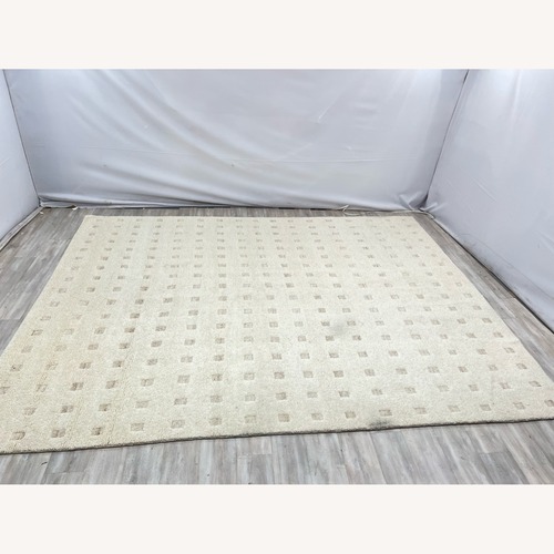 Used Jaipur Living Form And Weave Jinni FAW01 Ivory Rug 9' x 12' for sale on AptDeco