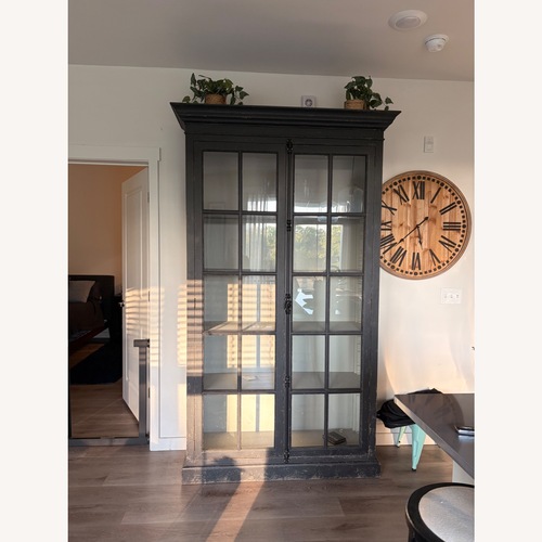 Used Arhaus Black Wood Armoire for sale on AptDeco