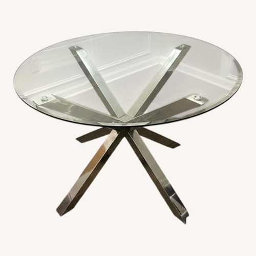 Used Rooms To Go Table Set with 4 Chairs  for sale on AptDeco