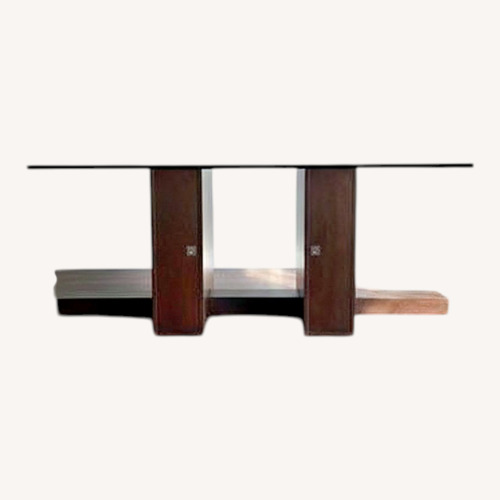 Used Dark Brown Glass Dining Table for sale on AptDeco
