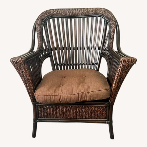 Used Pier 1 Imports Dark Brown Rattan Ottoman for sale on AptDeco