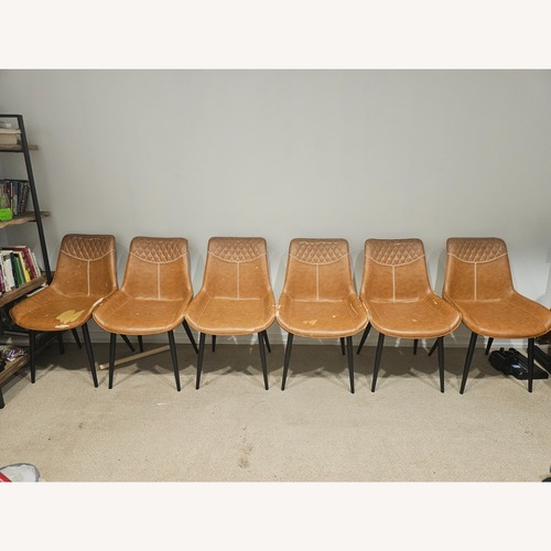 Used Amazon Hamilton Orange Leather Dining Chairs for sale on AptDeco