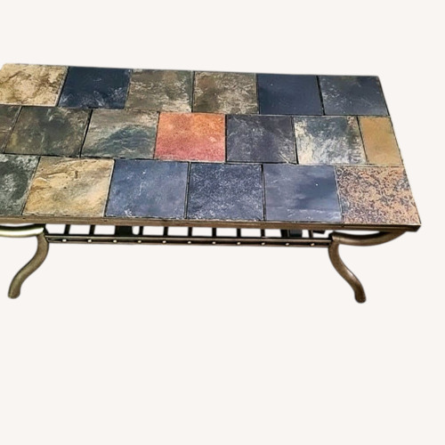Used Ashley Furniture Antigo Natural Stone Coffee Table for sale on AptDeco