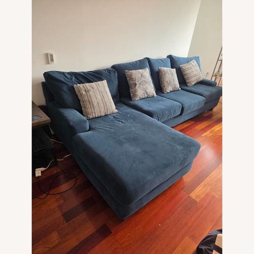 Used Living Spaces Harper Blue 3+ Piece Sectional for sale on AptDeco