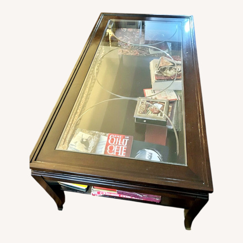 Used Vintage/Antique Dark Brown Coffee Table for sale on AptDeco