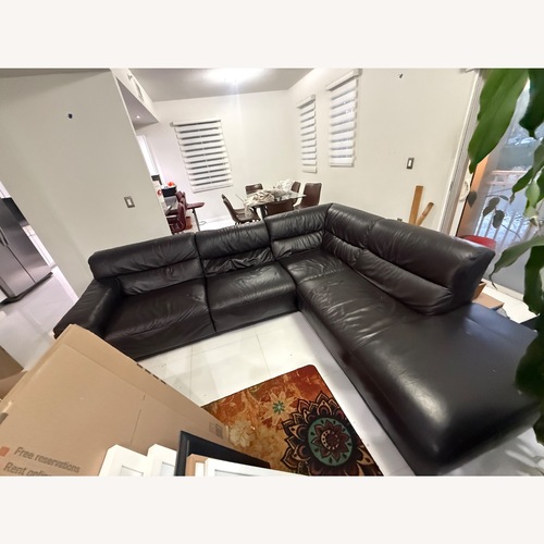 Used Leather Sectional for sale on AptDeco