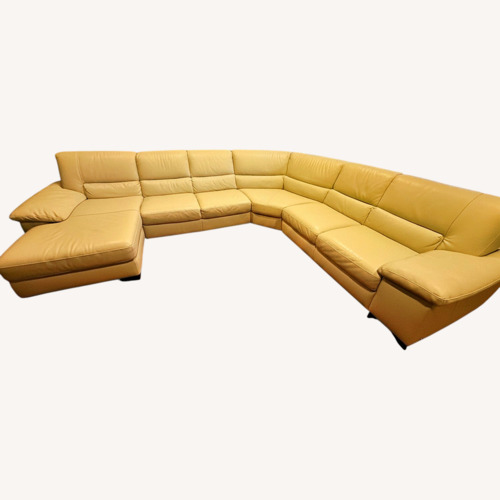 Used Beige 4-Piece Sectional Leather Sofa for sale on AptDeco
