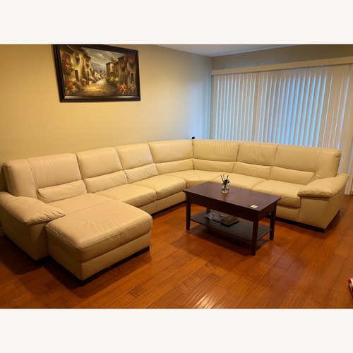 Used Beige 4-Piece Sectional Leather Sofa for sale on AptDeco