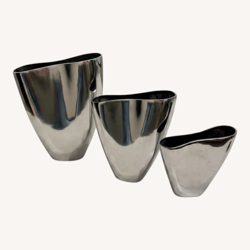 Used Set of 3 Polished Aluminum Decoative Vases for sale on AptDeco