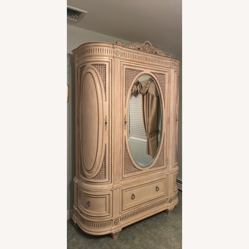 Used Mirrored Armoire with 6 Drawers for sale on AptDeco