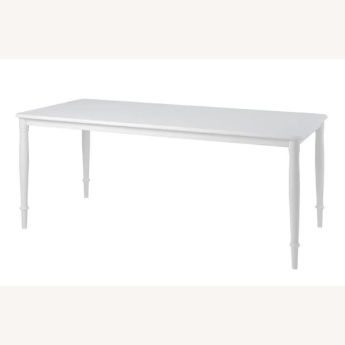 Used IKEA Danderyd White Wood Dining Table for sale on AptDeco