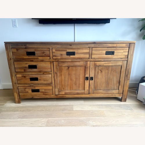 Used Macy's Natural Wood Media Storage/Buffet for sale on AptDeco