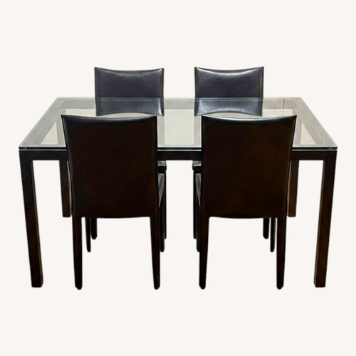 Used Dining Table with Glass Top and 4 Leather Chairs for sale on AptDeco