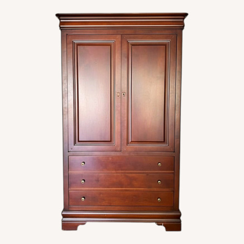 Used Vintage/Antique Finds Dark Brown Wood Armoire for sale on AptDeco