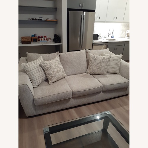 Used Raymour & Flanigan Vibrant Vision Oatmeal Couch  for sale on AptDeco