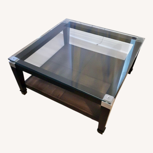 Used Raymour & Flanigan Dark Brown Wood Coffee Table for sale on AptDeco