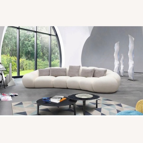 Used Big Cloud 141 Curved Sectional  for sale on AptDeco