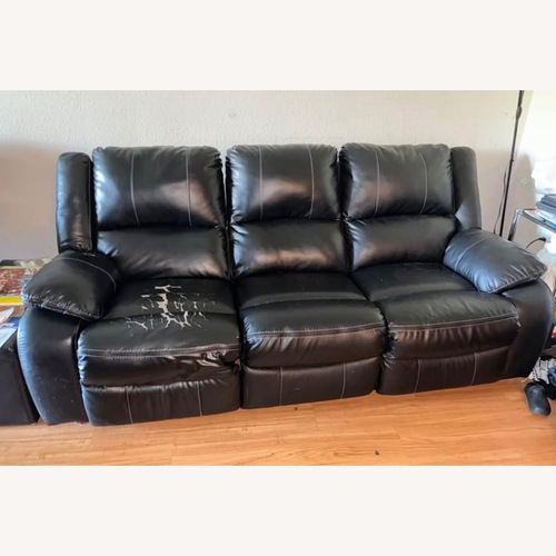 Used Ashley Furniture Black Reclining Couch for sale on AptDeco