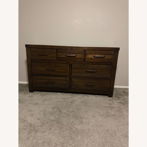 Used Dark Brown 7 Drawer Dresser for sale on AptDeco
