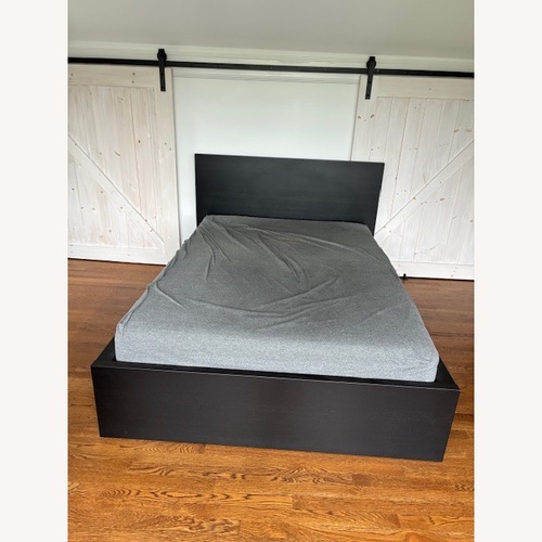 Used IKEA Malm Dark Brown Wood Full Bed for sale on AptDeco