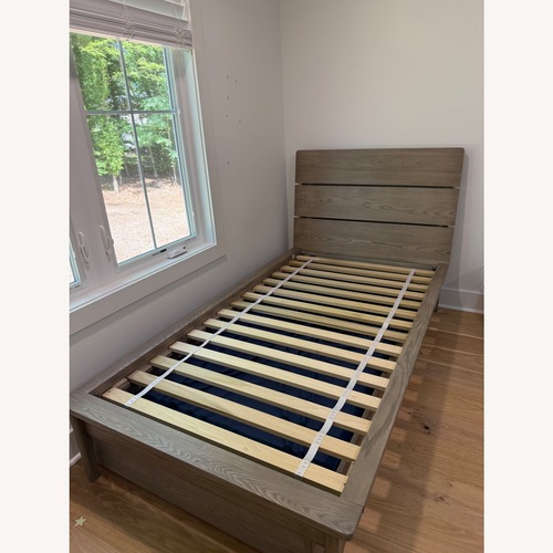 Used The Land of Nod Light Gray Wood Twin Bed for sale on AptDeco