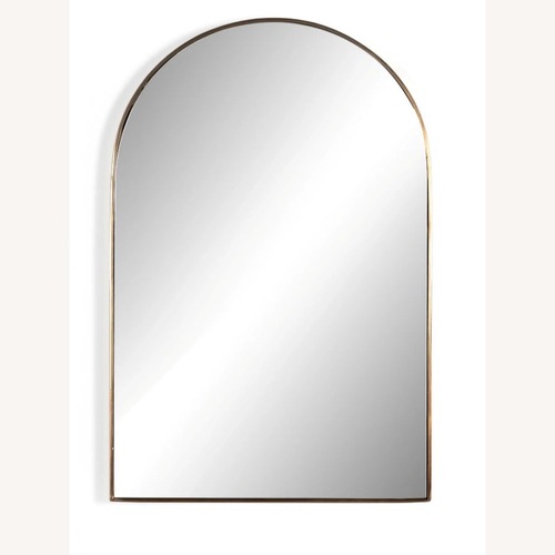 Used Four Hands Georgina Gold Brass Wall Mirror for sale on AptDeco