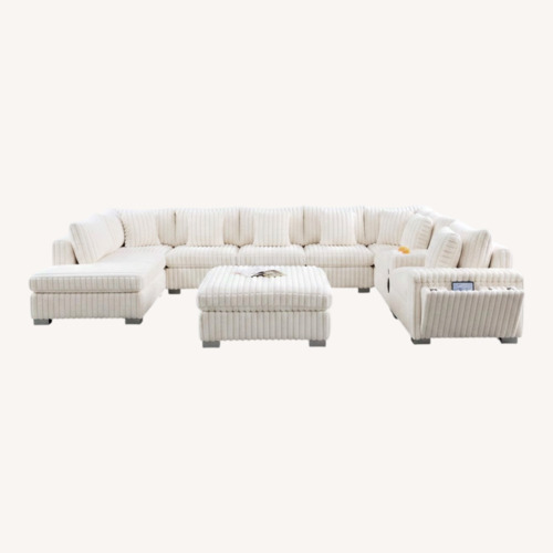 Used  7 Piece Cream Modular Sectional with Console  for sale on AptDeco