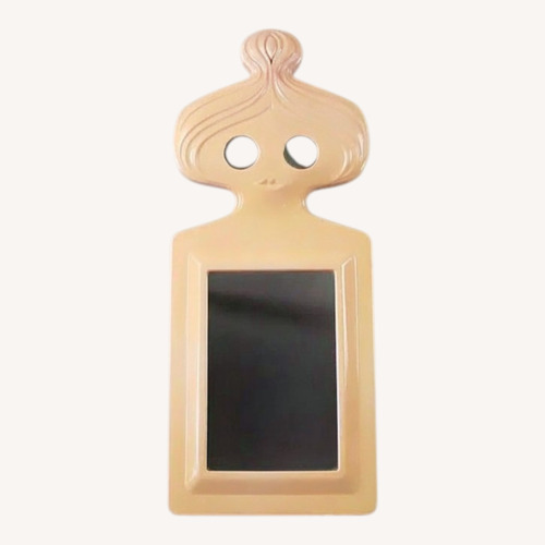 Used Mid Century Modern Figural Mirror for sale on AptDeco