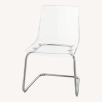 CB2 Transparent Dining Chairs