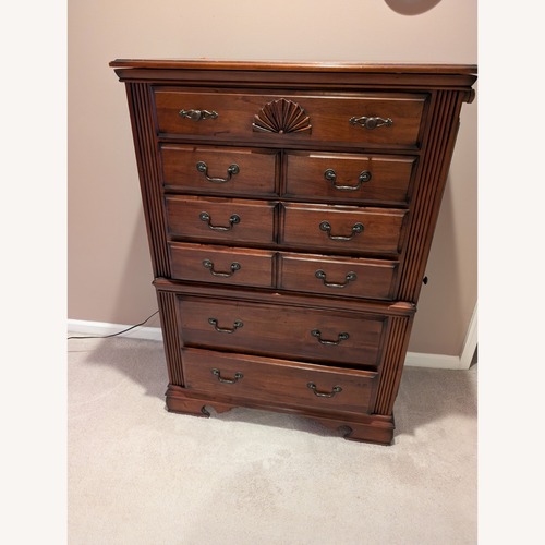 Used Raymour & Flanigan Dark Brown Marble Chest for sale on AptDeco