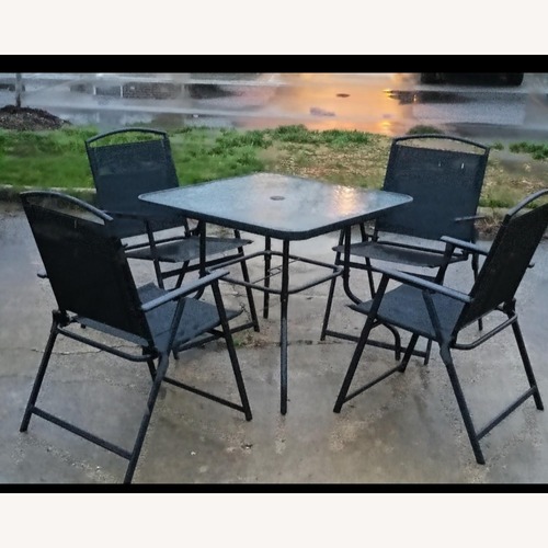 Used Black Glass Patio Furniture for sale on AptDeco
