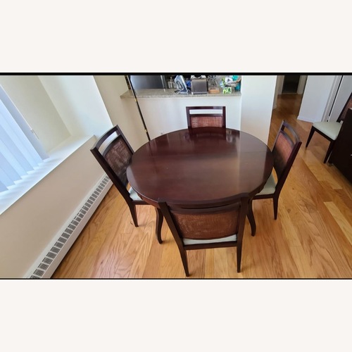 Used Baker Furniture Dark Brown Wood Dining Table for sale on AptDeco