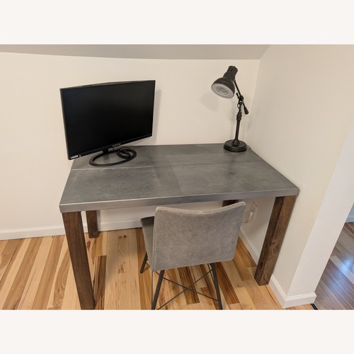 Used Crate & Barrel Galvin Silver Metal Dining Table for sale on AptDeco