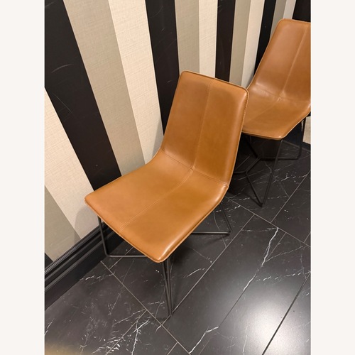 Used West Elm Slope Leather Dining Chair (Set of 2) for sale on AptDeco