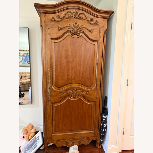 Used Pierre Deux Fabrics Dark Brown Wood Armoire for sale on AptDeco