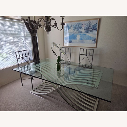 Used  Glass Dining Table for sale on AptDeco