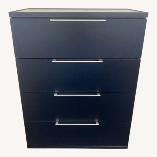 Used Black 4-Drawer Wood Chest for sale on AptDeco
