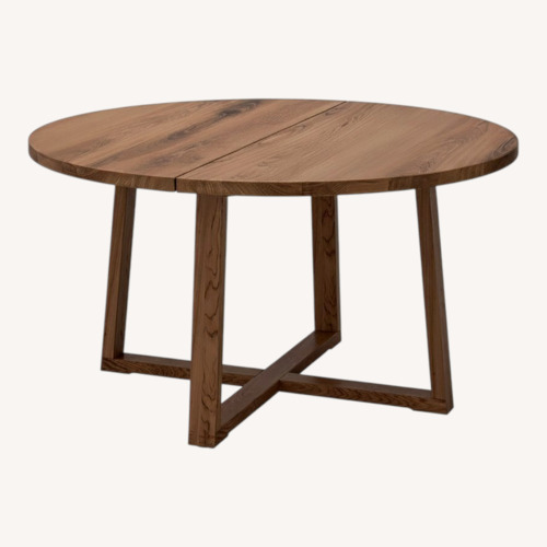 Used IKEA Dark Brown Wood Dining Table for sale on AptDeco