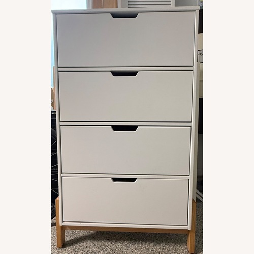 Used 4-Drawer 45" Tall Chest with Cutout Handles for sale on AptDeco