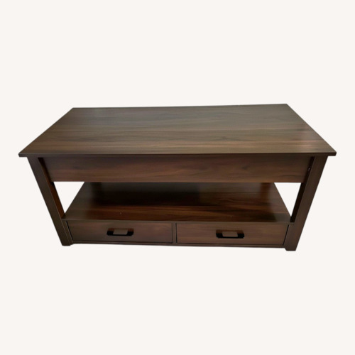 Used Dark Brown Wood Coffee Table for sale on AptDeco