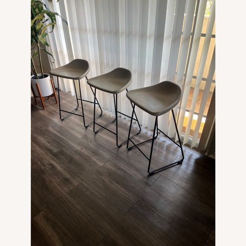 Used Pottery Barn Brenner Light Gray Leather Stools for sale on AptDeco