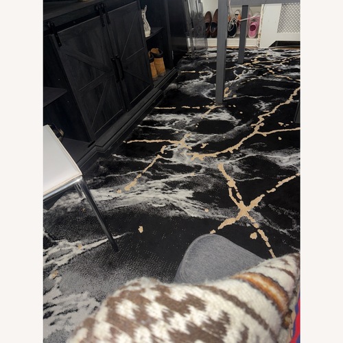 Used Amazon Black & Gold Living Room Rug for sale on AptDeco