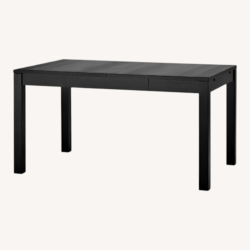 Used IKEA Extendable Dark Brown Wood Dining Table for sale on AptDeco