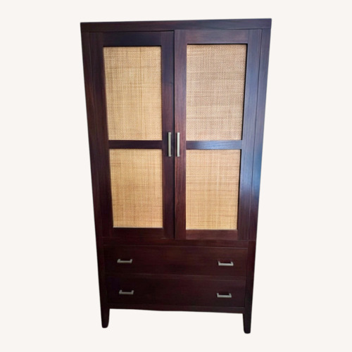 Used Crate & Barrel Dark Brown Rattan Armoire for sale on AptDeco