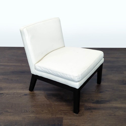 Used Modern White Armless Faux Leather Lounge Chair  for sale on AptDeco