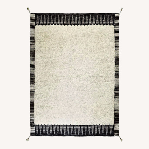 Used West Elm Ikat 5'x8' Black and White Shag Rug for sale on AptDeco