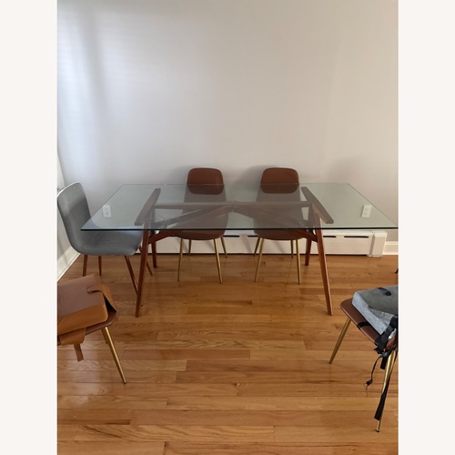 Used West Elm Jensen Transparent Glass Dining Table for sale on AptDeco