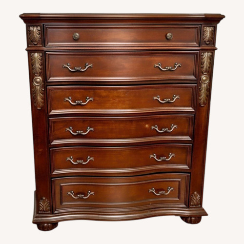 Used Ashley Dark Cherry Wood Chest Dresser for sale on AptDeco